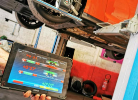 A piece of wheel alignment equipment.